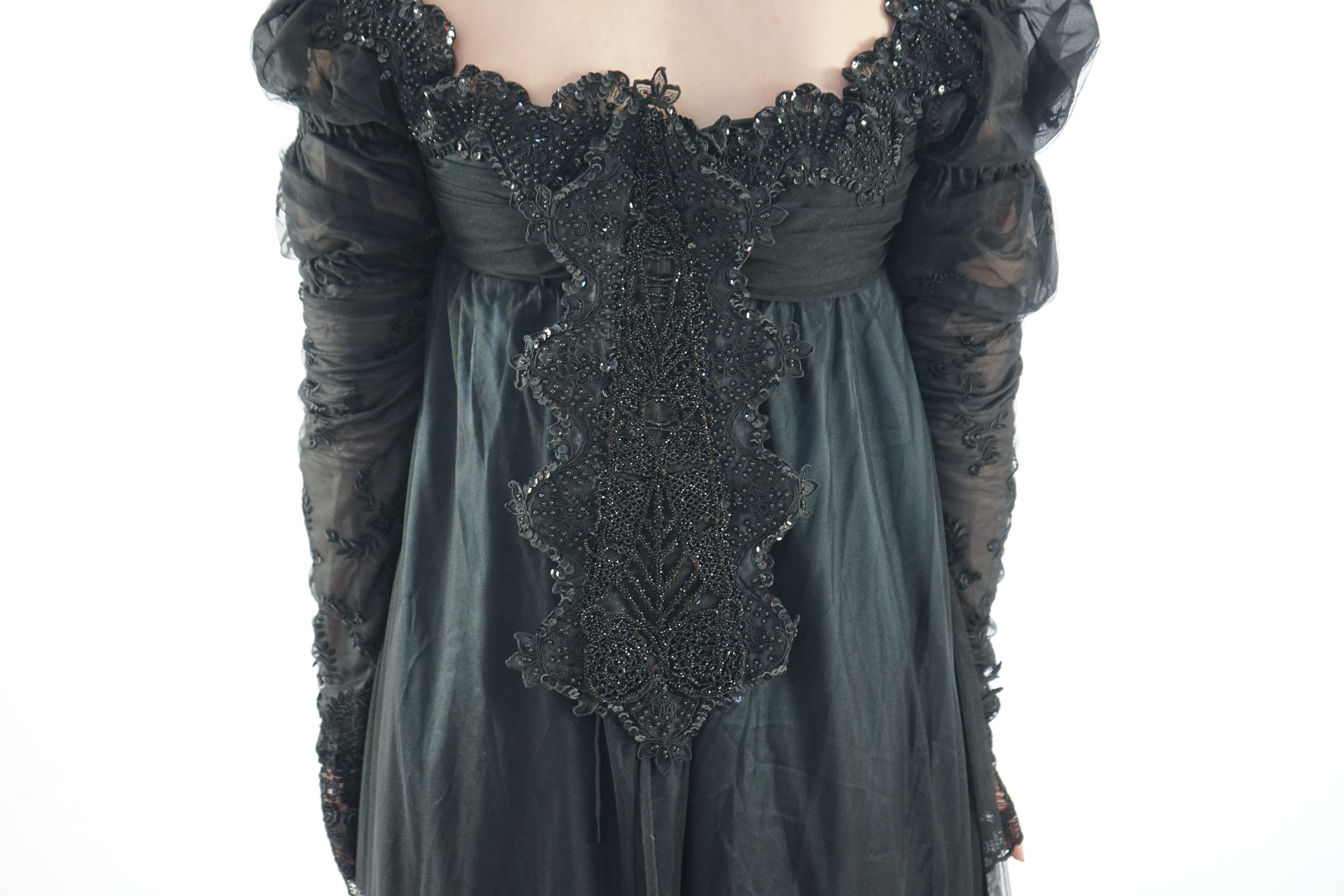 A fine quality lady's black satin, chiffon and jet trimmed Regency style evening dress with long train, lacing on jet stomacher. Ex English National Opera (unlabelled) 'Don Giovanni'